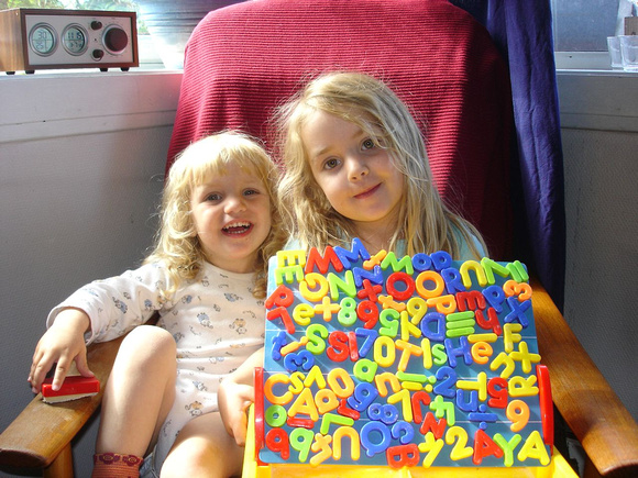 Sara and Emma learning the letters