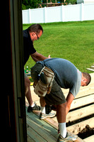 Nate and a friend building the new deck at Jamies